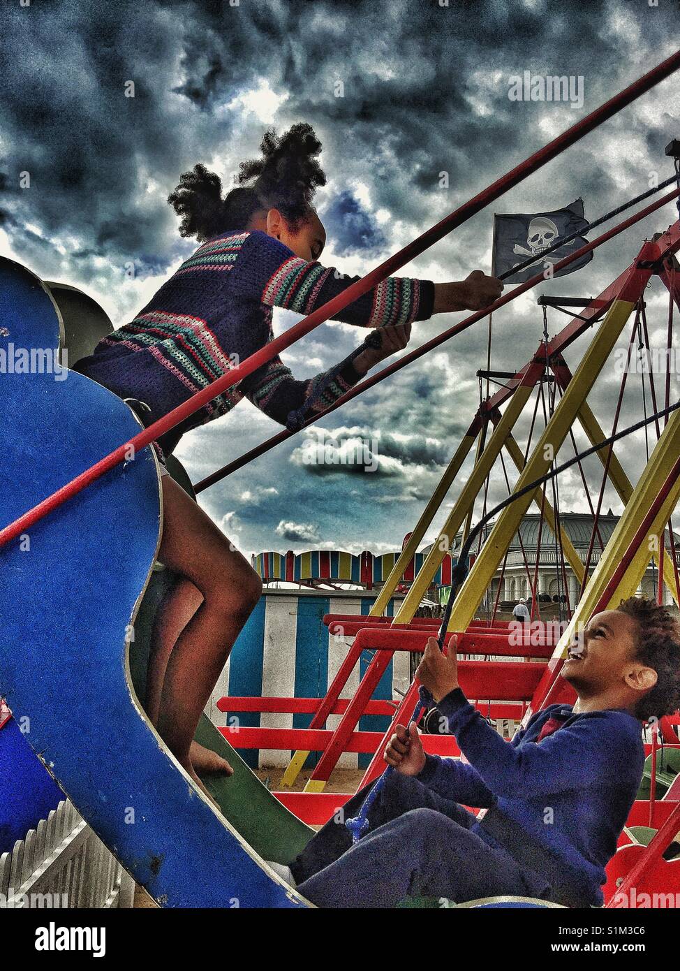 Kids at the fair ground Stock Photo - Alamy