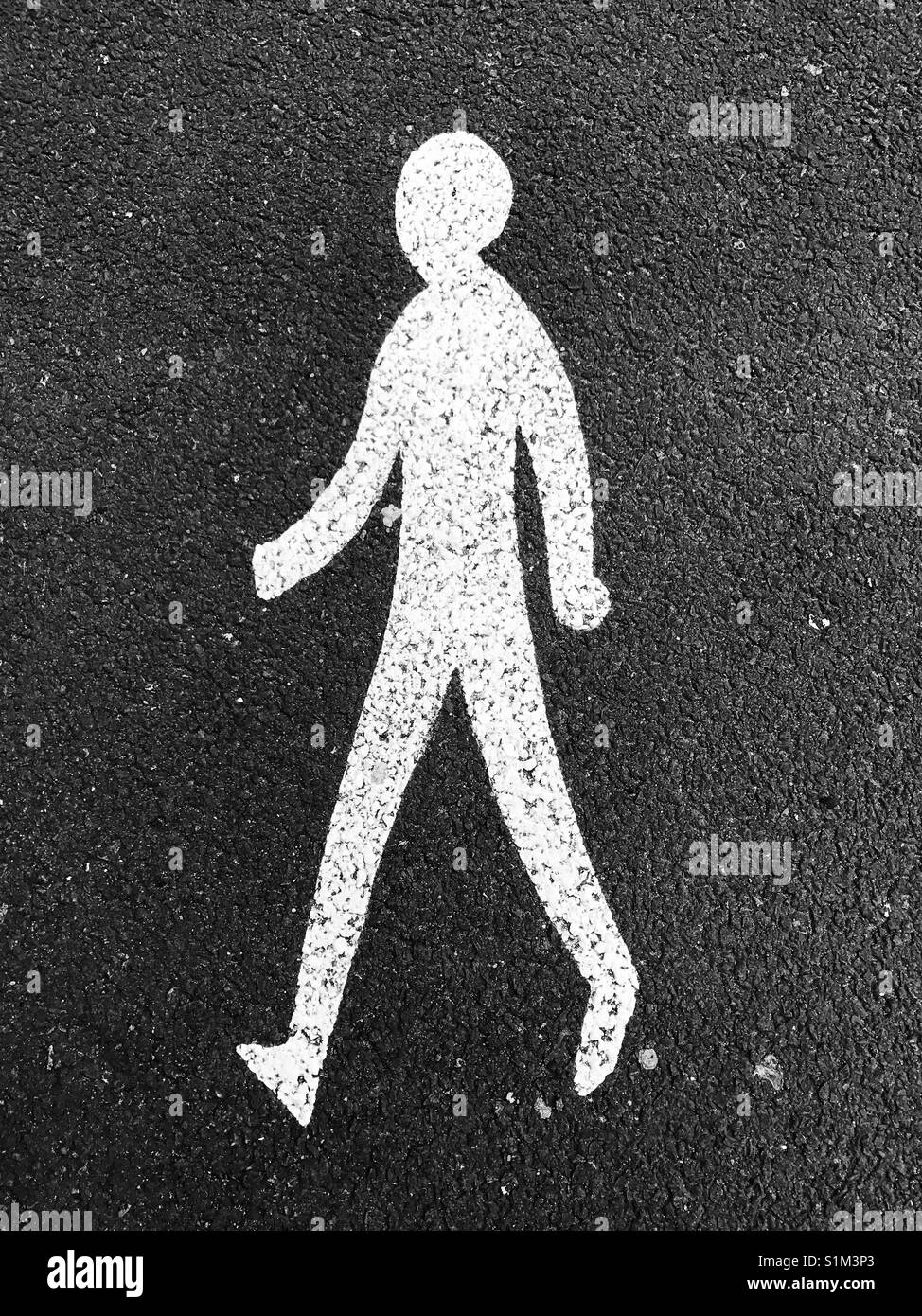 Painted graphic of a pedestrian walking. - Smartphone Captured Stock Image