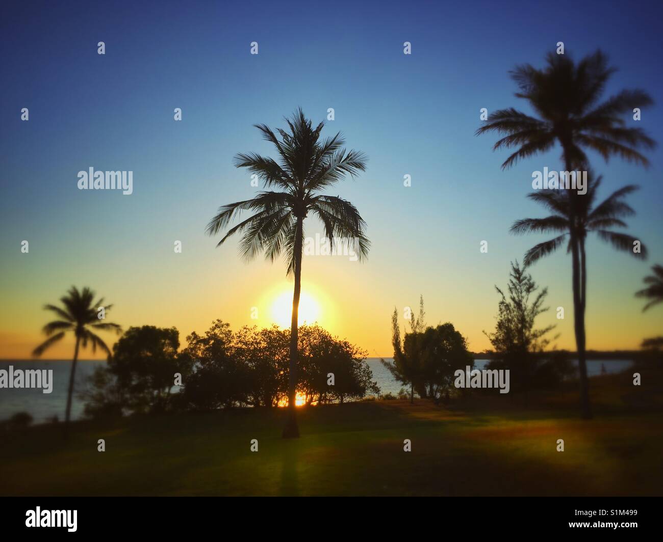 Tropical sunset at Fannie Bay in Darwin, Northern Territory, Australia. Stock Photo