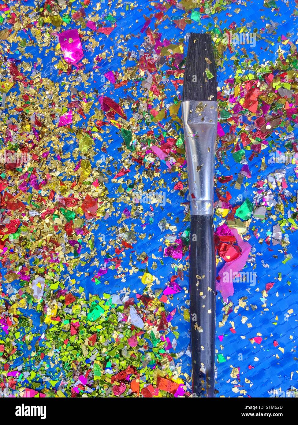 Paint brush and glitter. Stock Photo