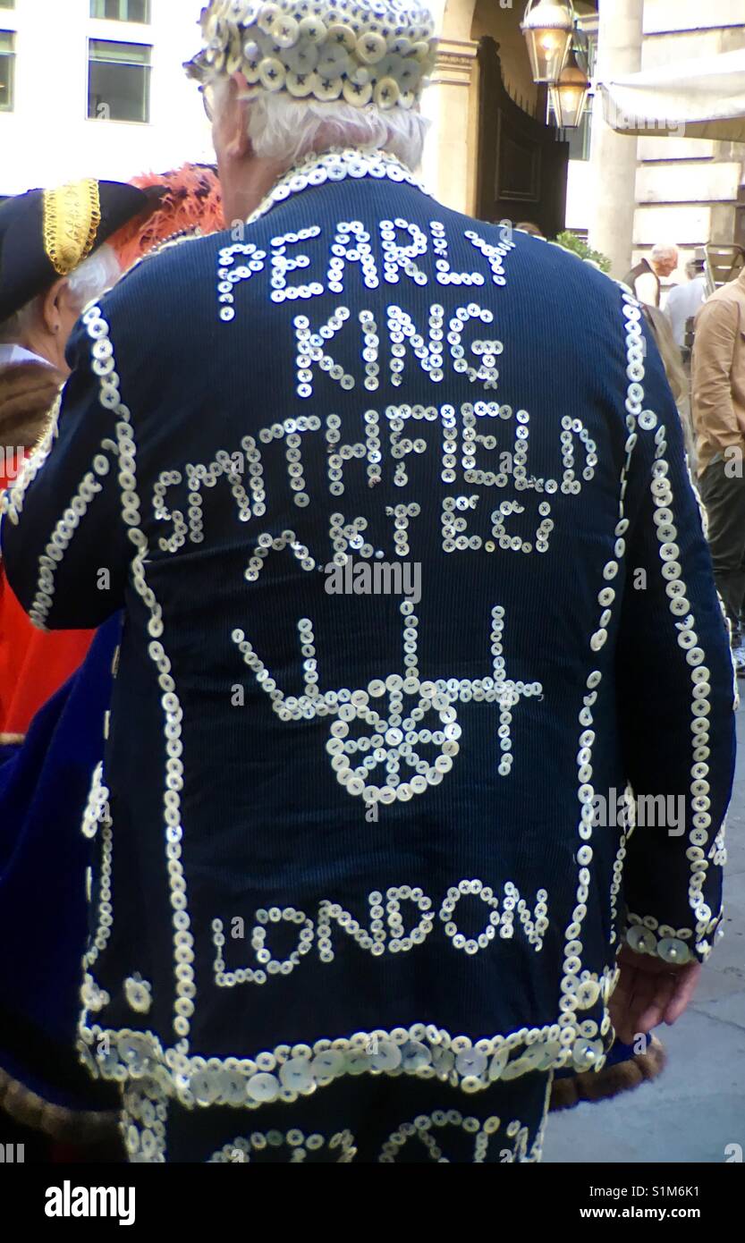 Cockney Man wearing decorated pearly King jacket at London Costermongers festival Stock Photo