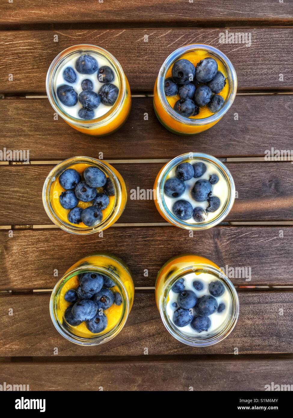 Yoghurt desserts with blueberries Stock Photo Alamy