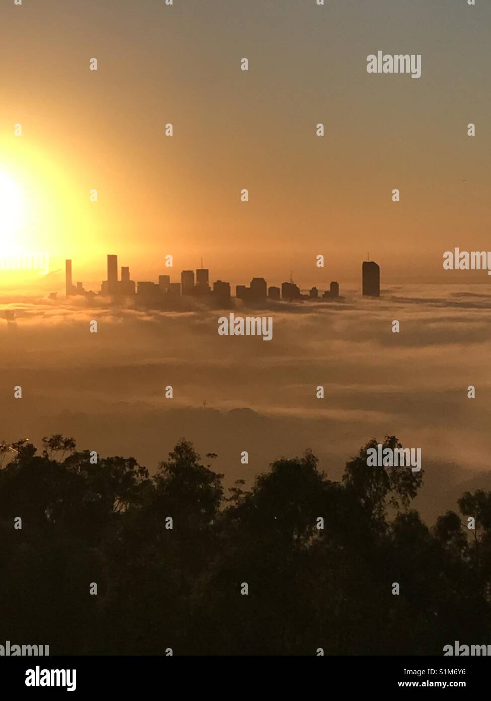 'Hidden City' Brisbane shrouded in thick fog. Stock Photo