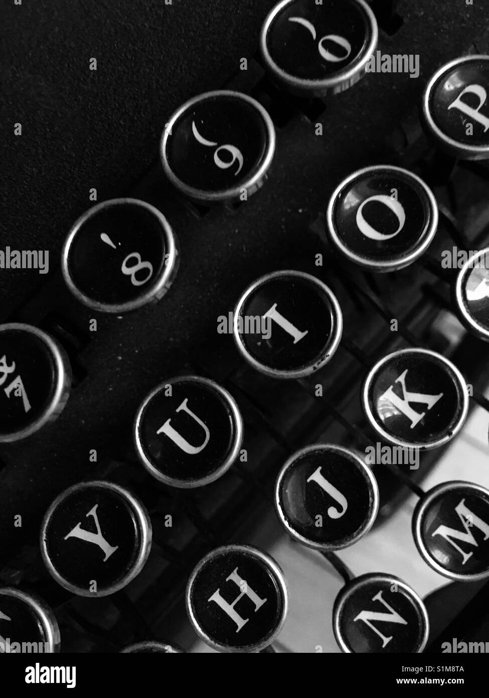 Angled shot of vintage typewriter keys Stock Photo