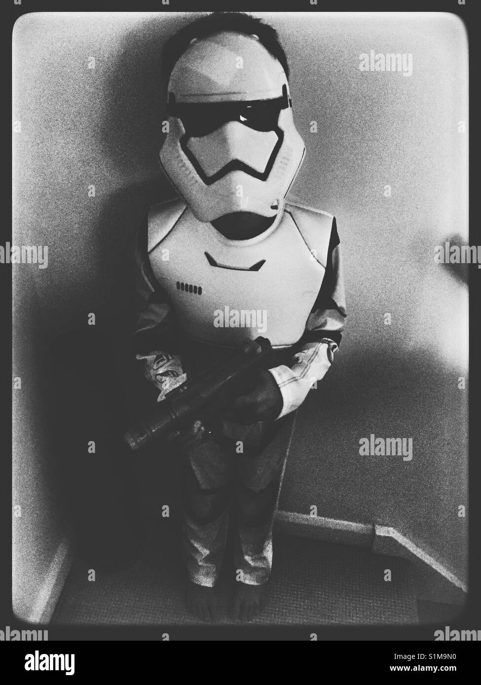 Boy wearing a Star Wars First Order Stormtrooper costume. Stock Photo