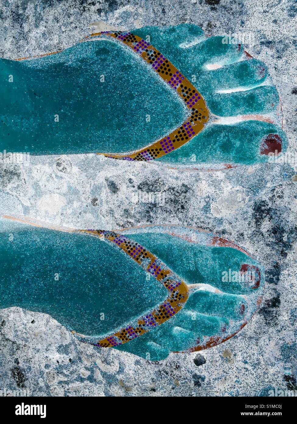 Feet in flip flops - Smartphone Captured Stock Image