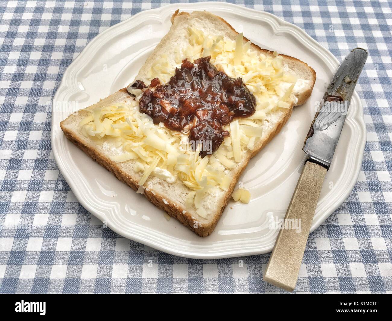 Grated cheddar cheese sandwich with Branston pickle Stock Photo Alamy