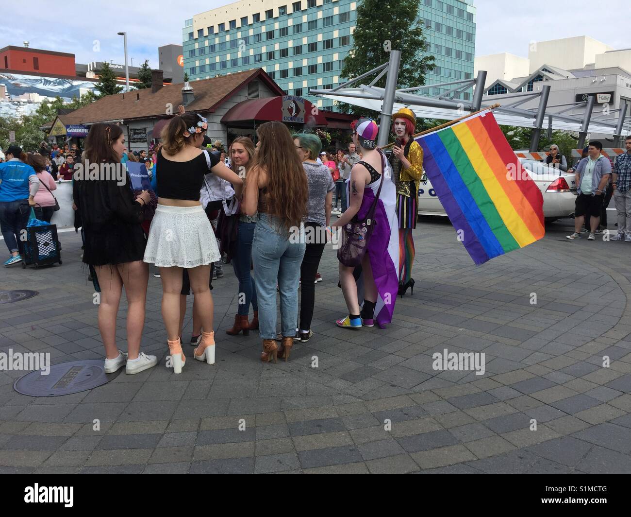 Teenagers out and proud celebrating diversity at the gay pride march in Anchorage, Alaska, United States Stock Photo