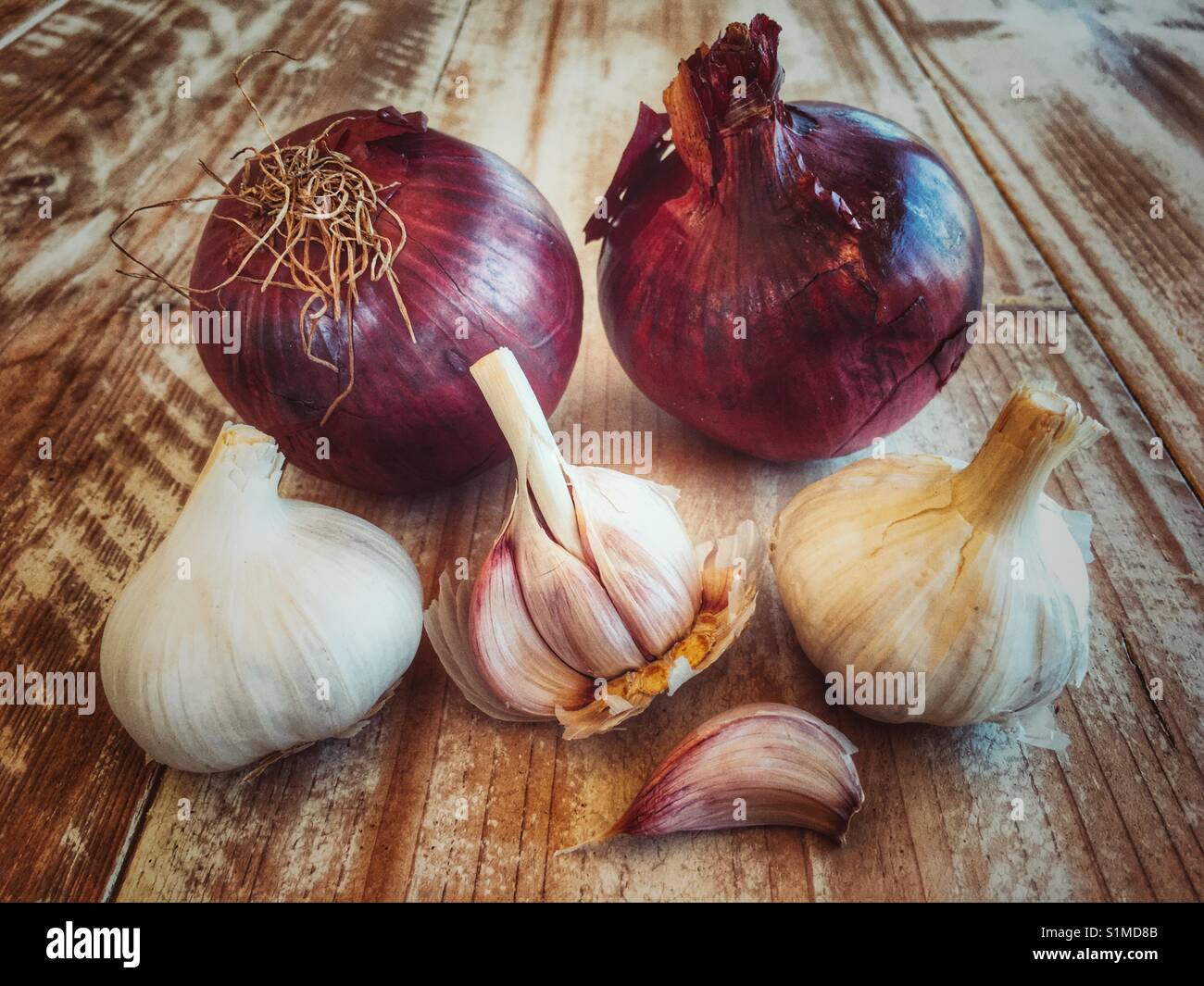 Red onions and garlic bulbs - Smartphone Captured Stock Image
