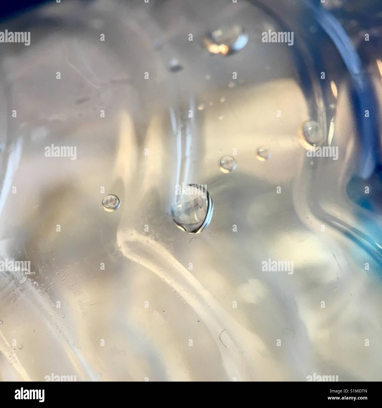 Close shot of drop of water in plastic water bottle - Smartphone Captured Stock Image