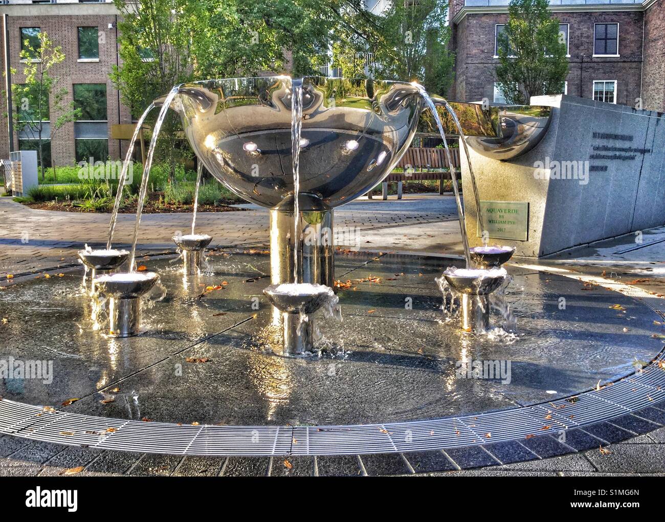 Reflective water fountain feature in Toronto Grange Park. Stock Photo