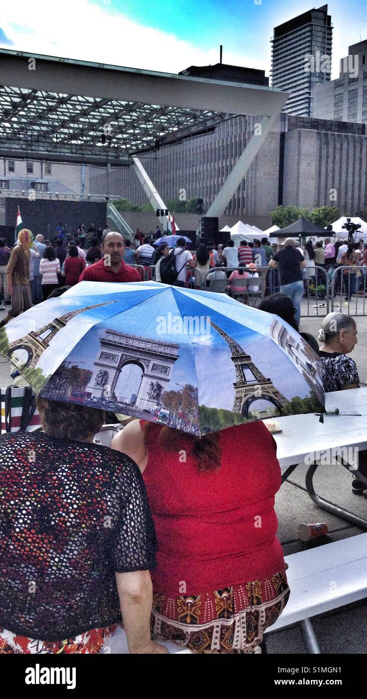 People enjoying a festival at Nathan Phillips Square in downtown Toronto. Stock Photo