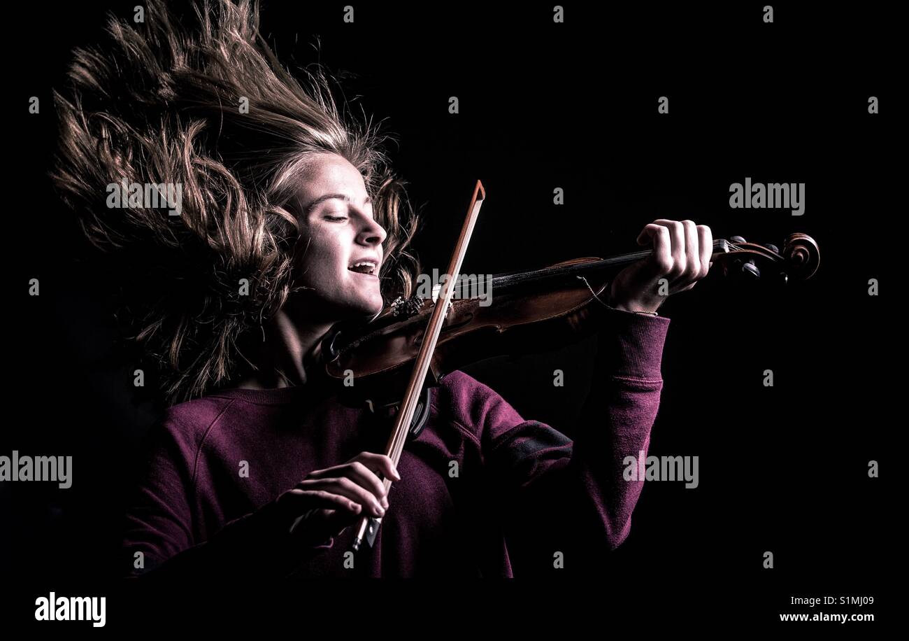 Wild Female Teenage Violinist Stock Photo