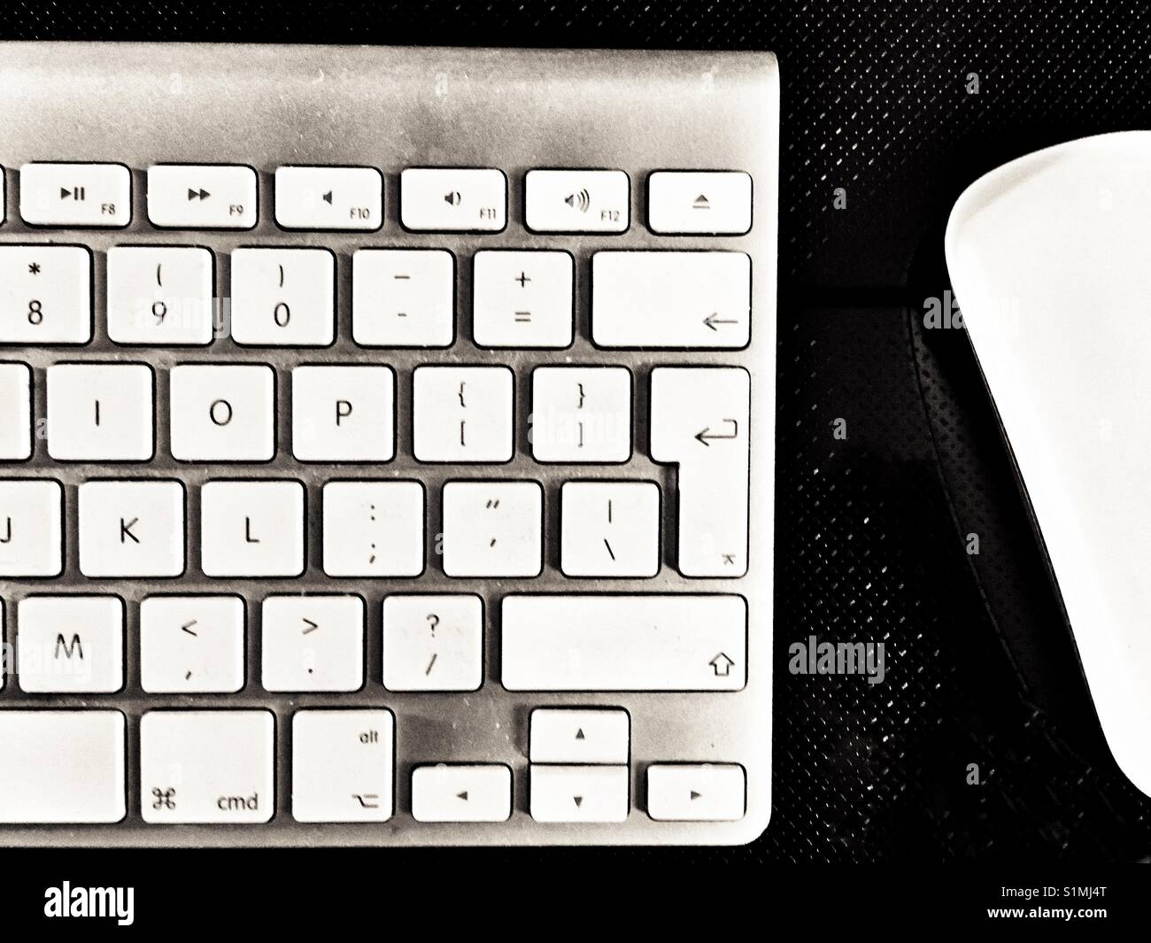 Apple keyboard and mouse - Smartphone Captured Stock Image