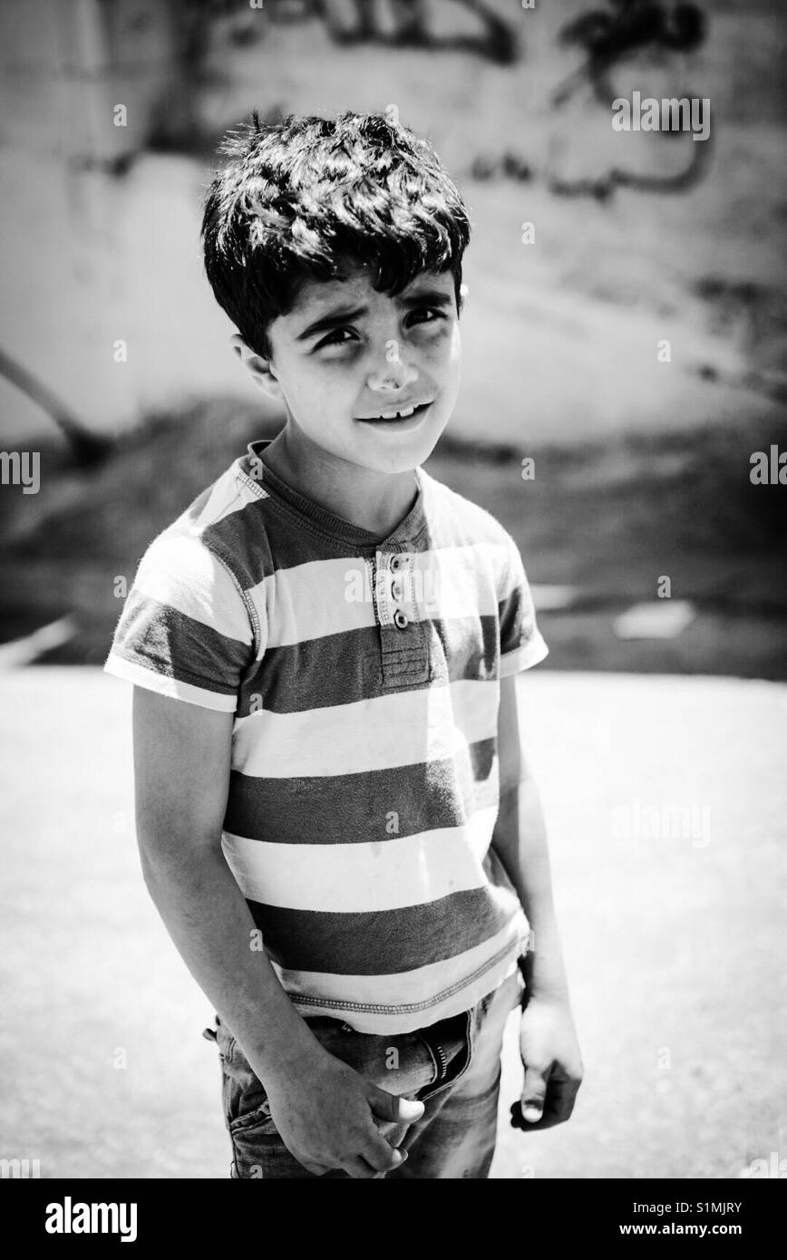 A refugee child in Aida Camp in Bethlehem, Palestine. Stock Photo