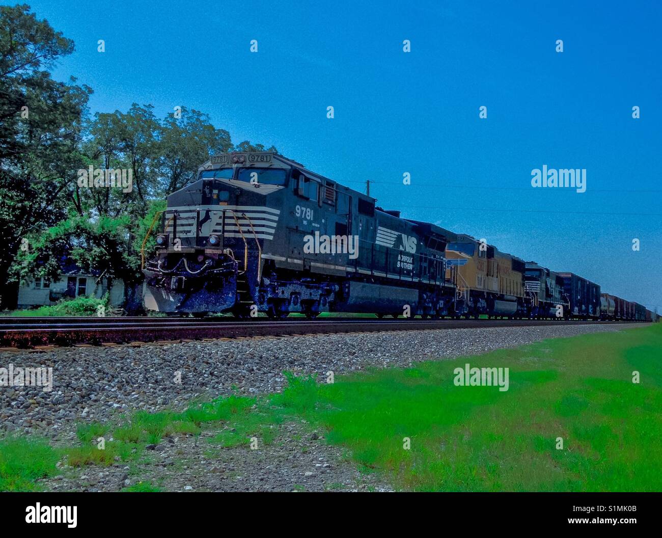 Colorful photo of Norfolk Southern engine 9781 and train headed towards Salisbury, North Carolina Stock Photo