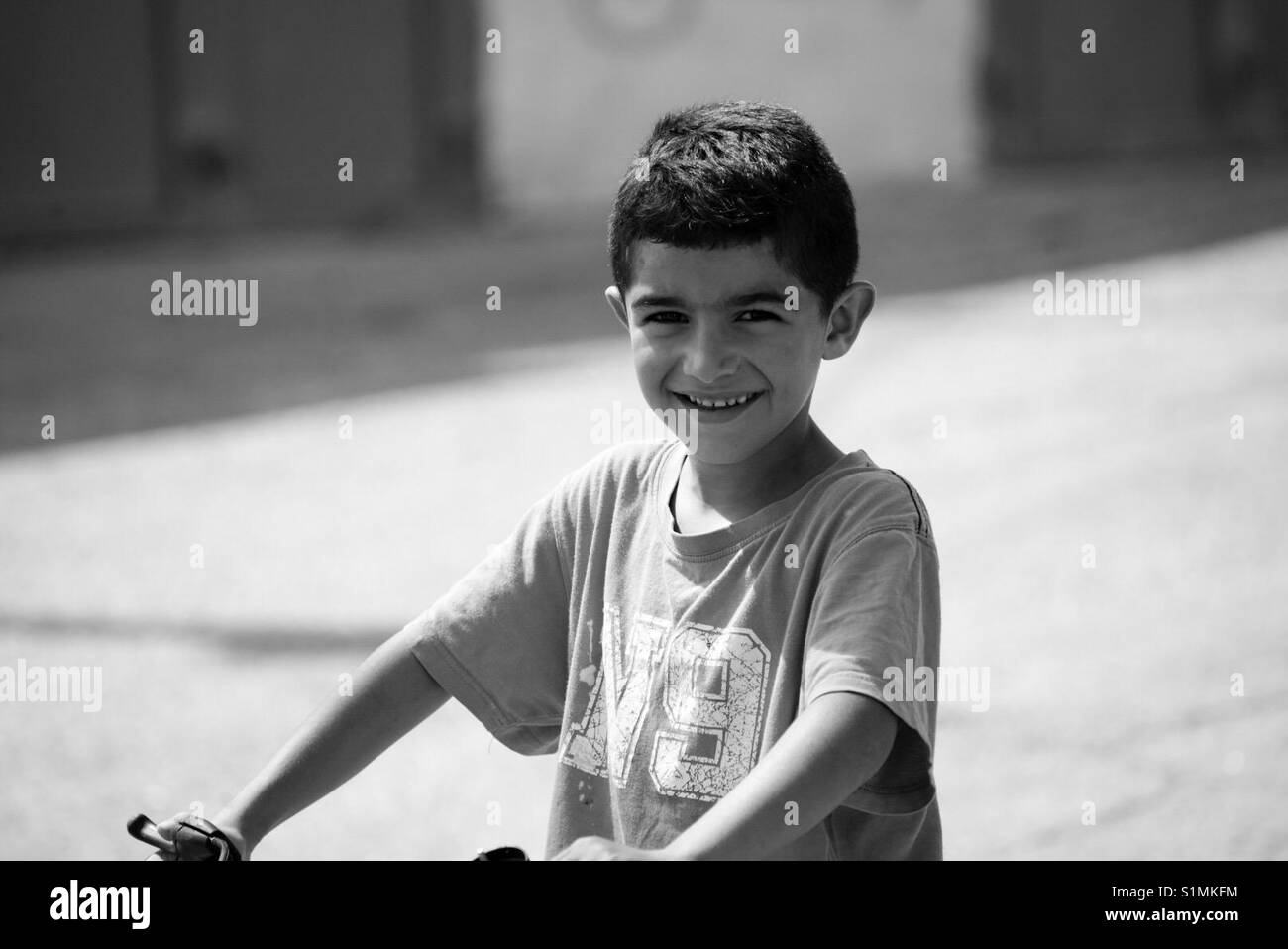 A refugee child in Aida Camp in Bethlehem, Palestine. - Smartphone Captured Stock Image