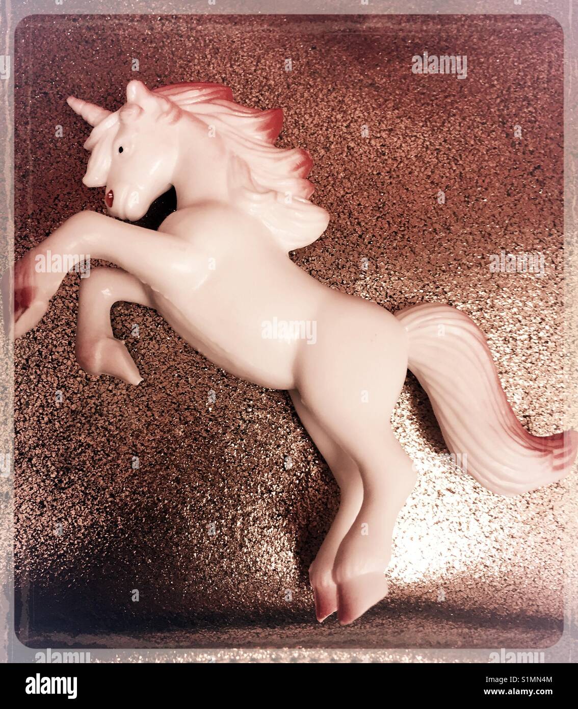white plastic unicorn toy - Smartphone Captured Stock Image