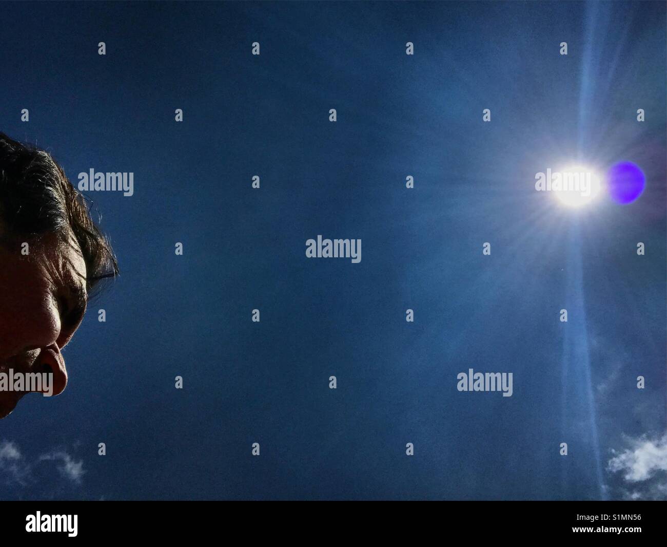 Self portrait facing the solar eclipse in Mexico - Smartphone Captured Stock Image