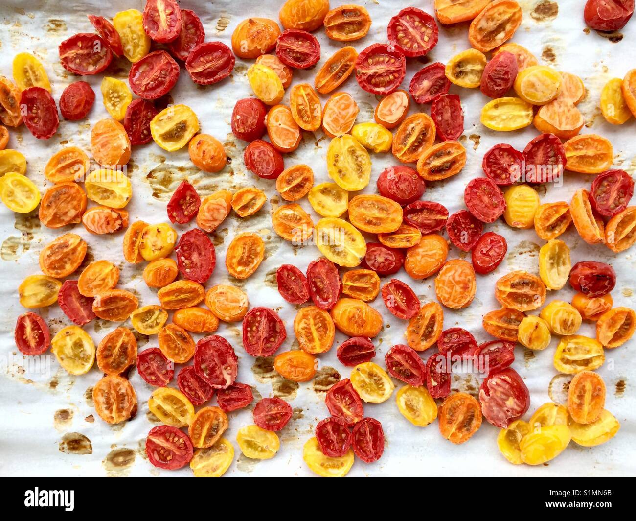 Local grape tomatoes slowroasted with olive oil then frozen, ready for