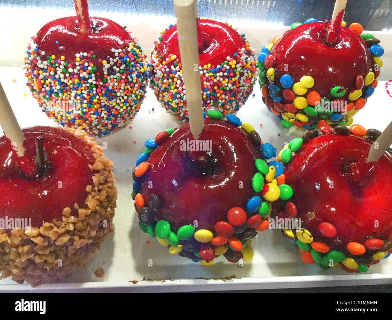 Bright red candy apples Stock Photo Alamy