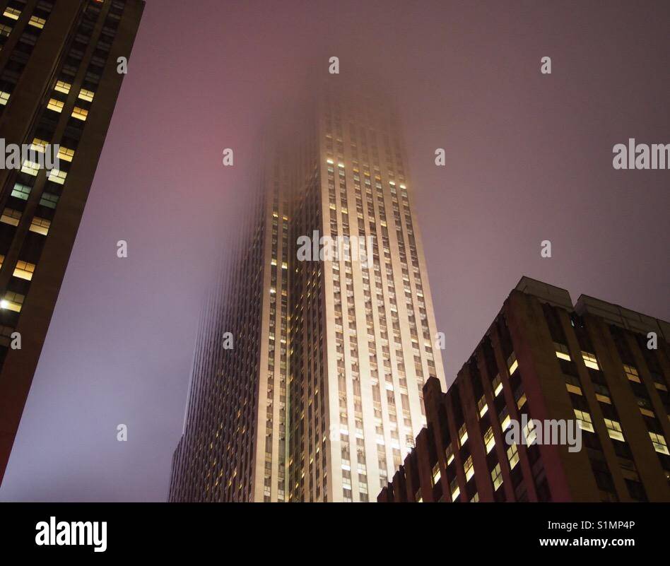 Rockefeller Centre NYC in low clouds at night Stock Photo