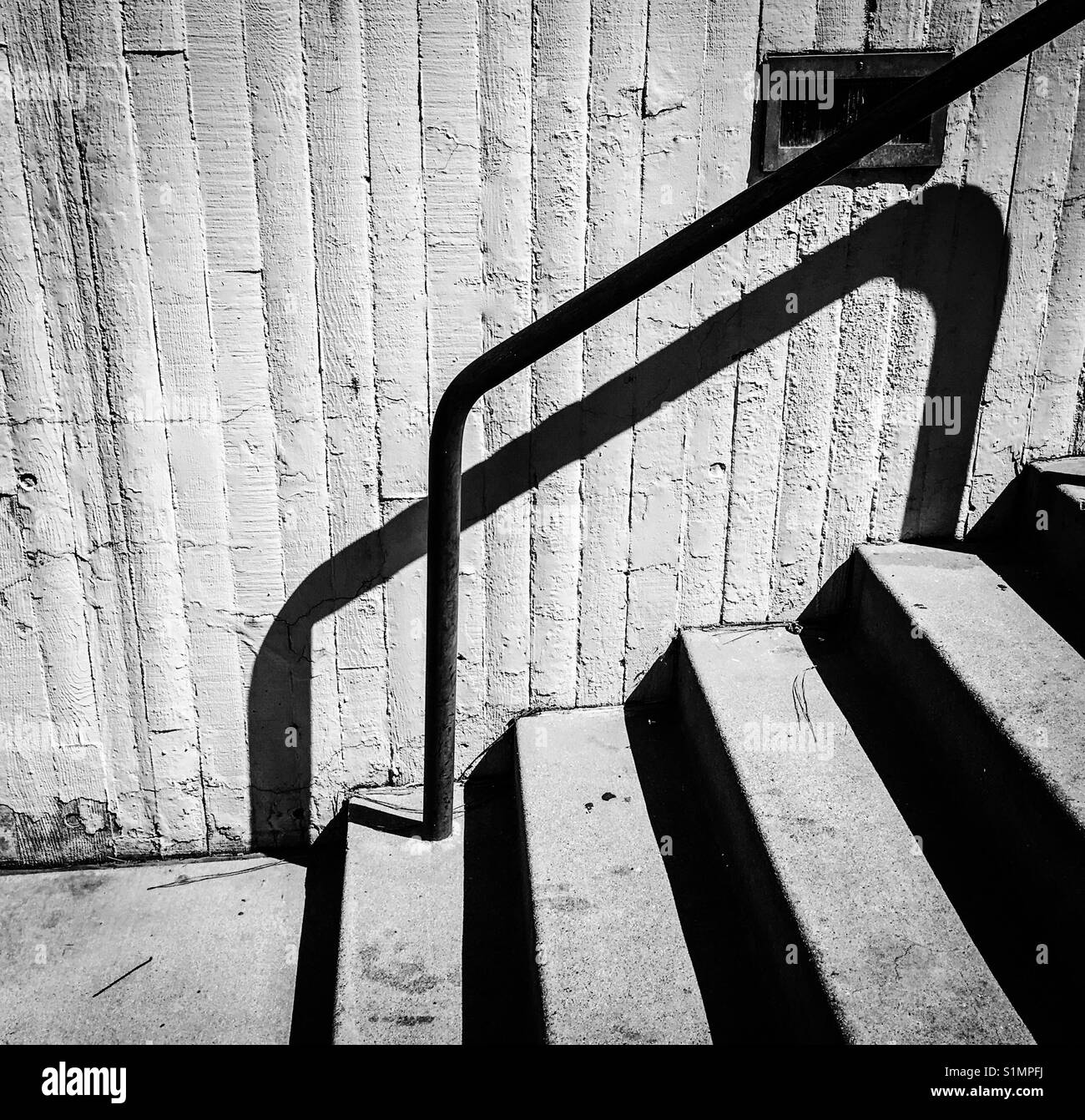 Stairway with dramatic shadows in black and white Stock Photo Alamy