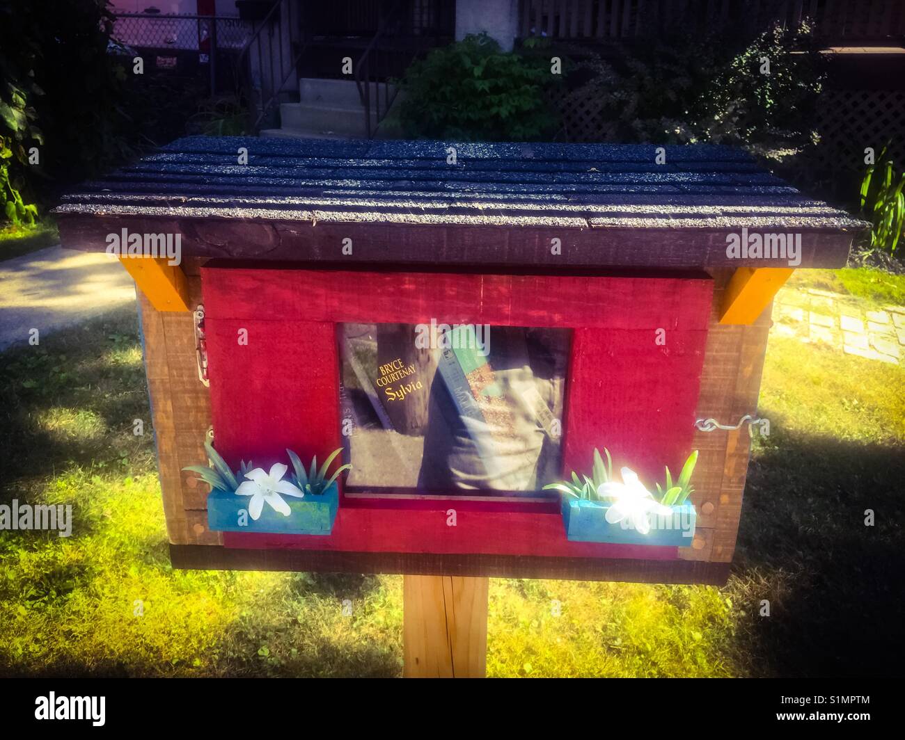 Small free neighbourhood library - Smartphone Captured Stock Image