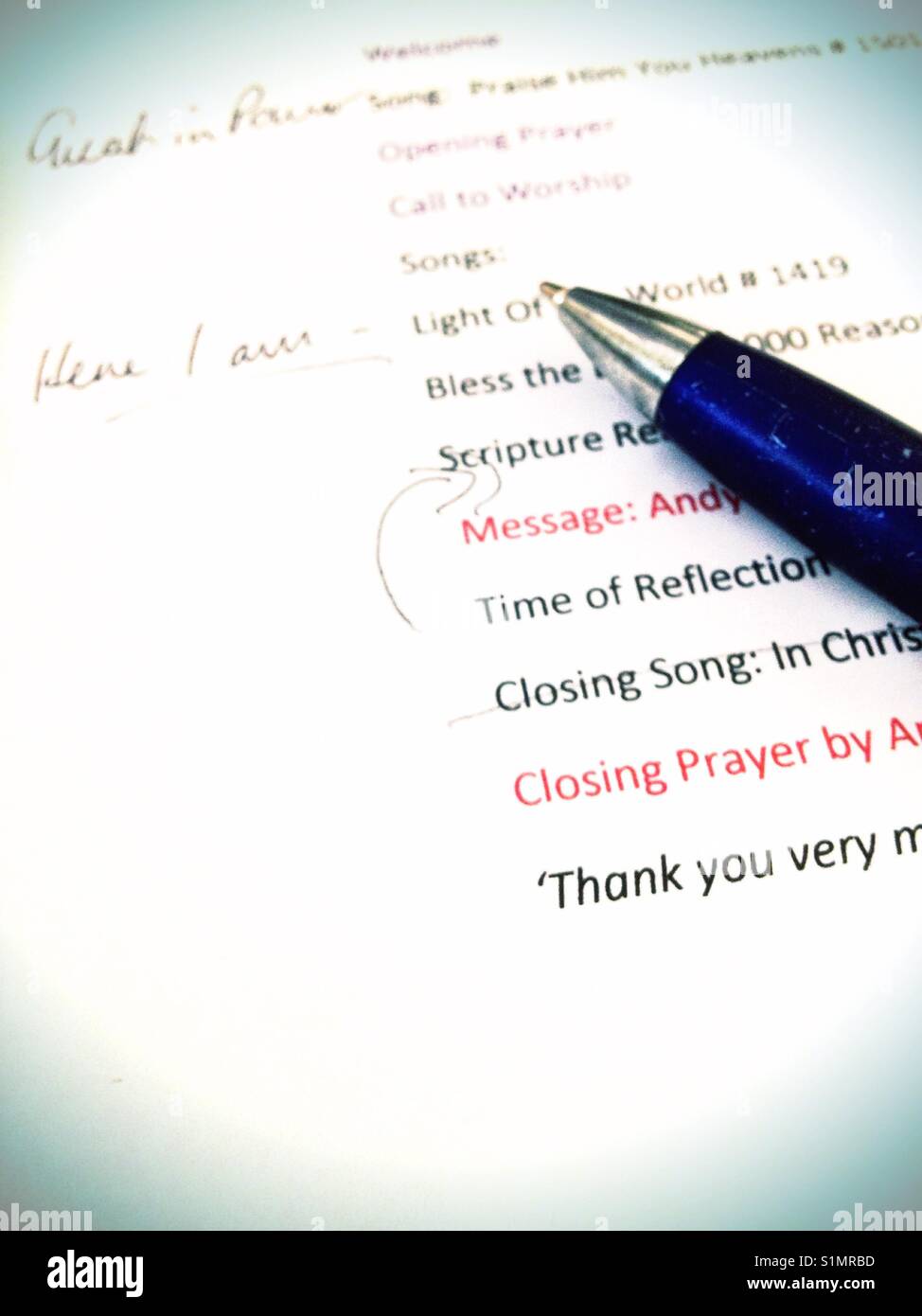 Making corrections to text printed on white paper. - Smartphone Captured Stock Image