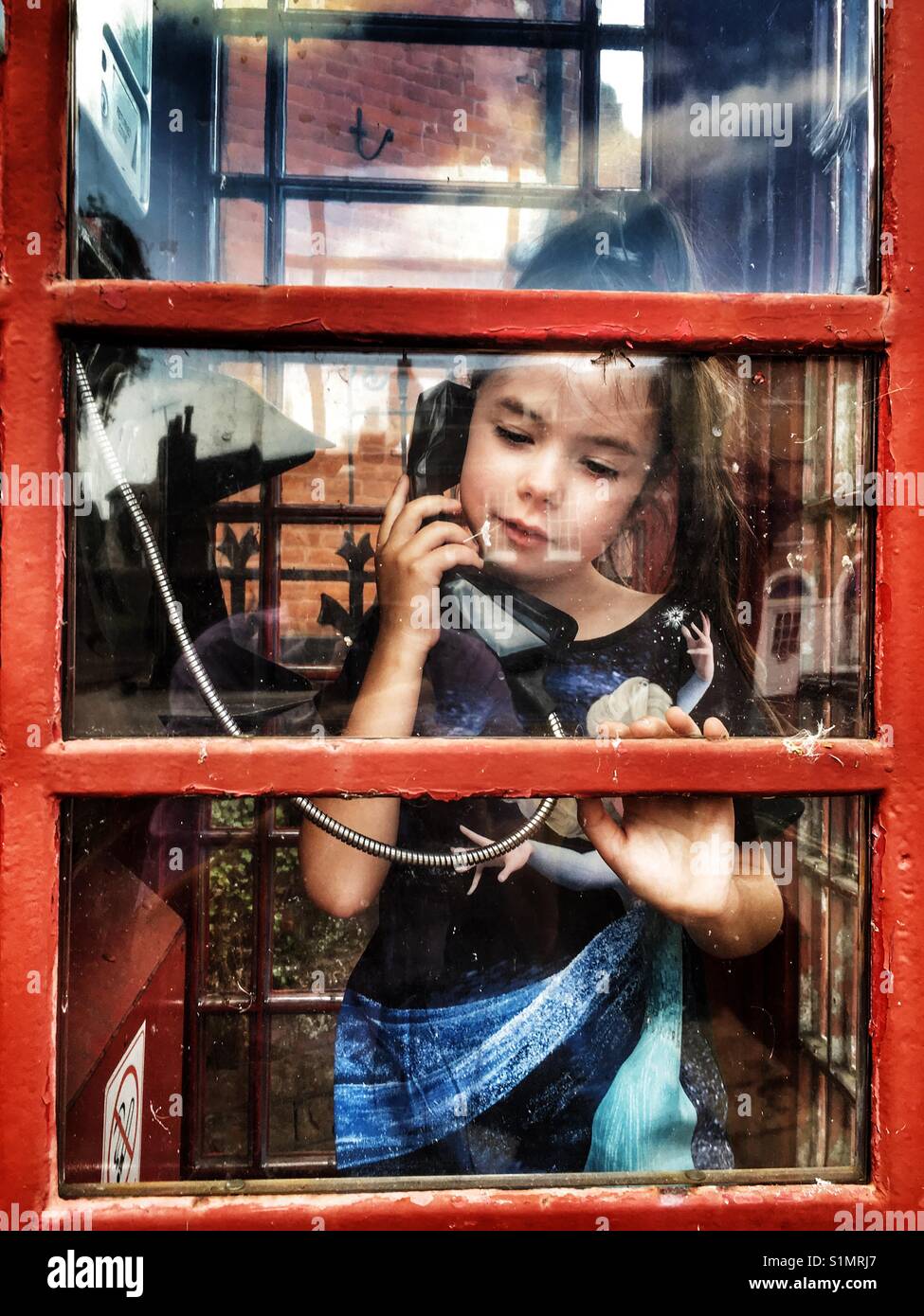 Red telephone box - Smartphone Captured Stock Image