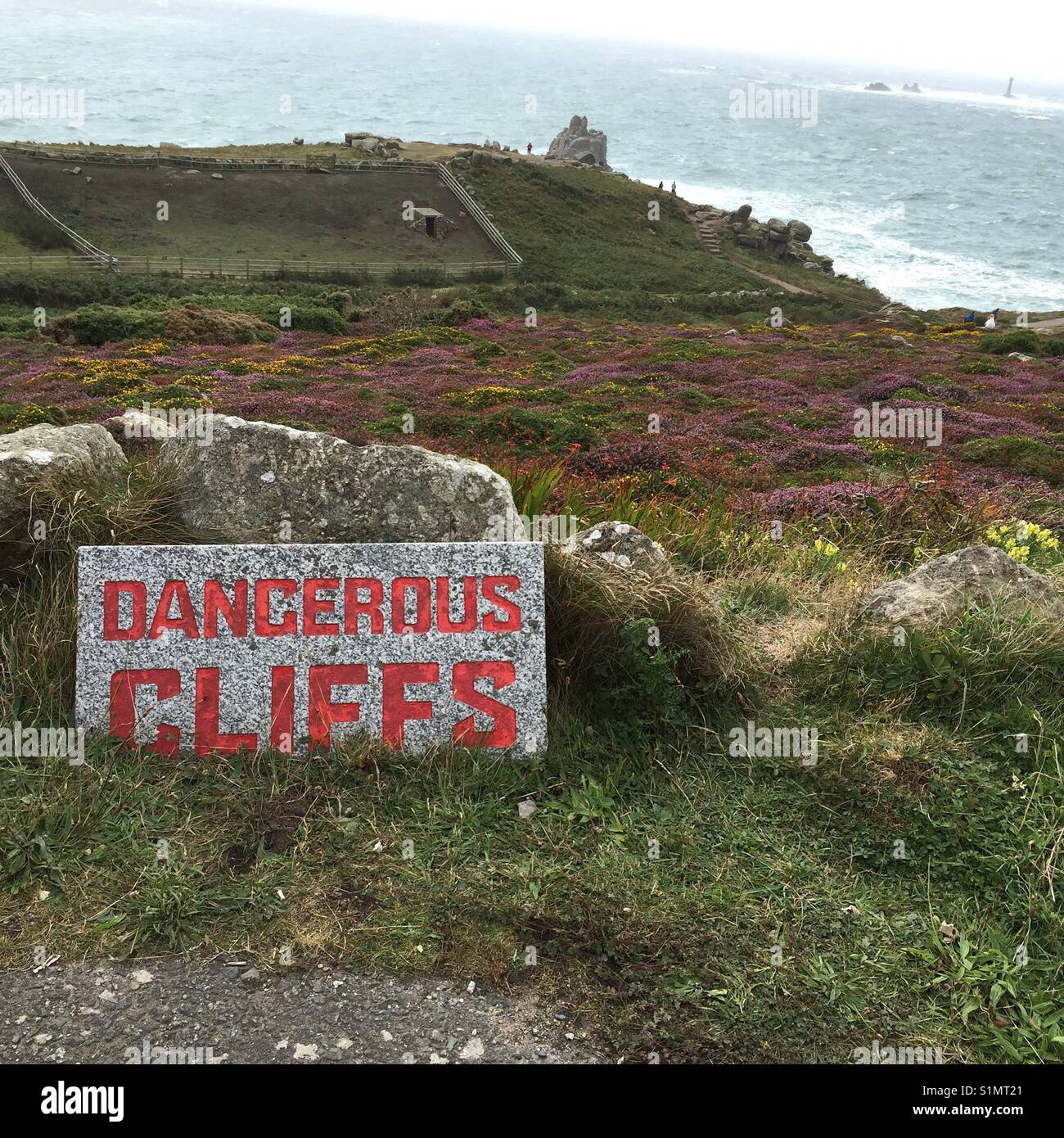 Dangerous Cliffs sign, Land's End, Cornwall, UK - Smartphone Captured Stock Image