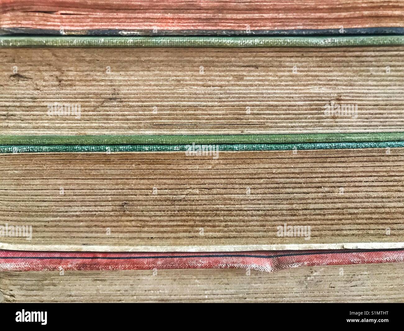 Close-up of the well used and faded pages of old books - Smartphone Captured Stock Image