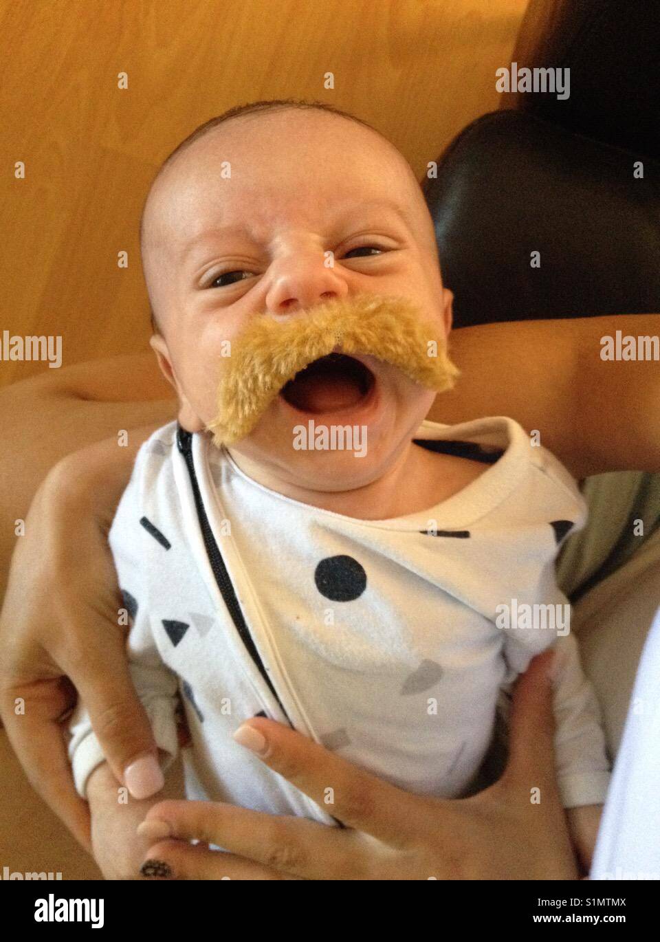 Baby With Fake Moustache Stock Photo Alamy Baby With Fake Moustache Stock Photo Alamy