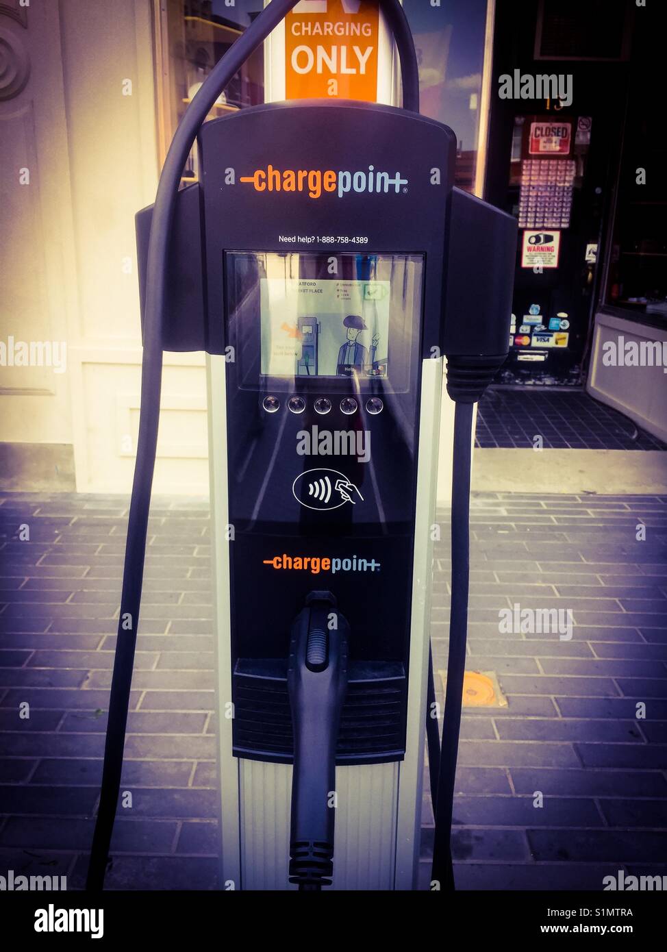 Charge point for electric vehicles - Smartphone Captured Stock Image