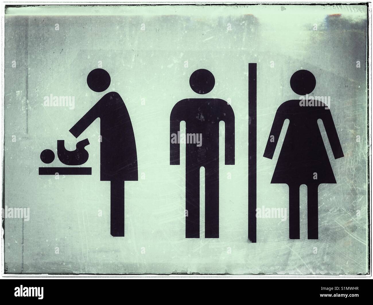 A grunge effect picture of a sign that illustrates toilet (restrooms or bathrooms) and baby changing (nappy change) facilities. Photo © COLIN HOSKINS. Stock Photo