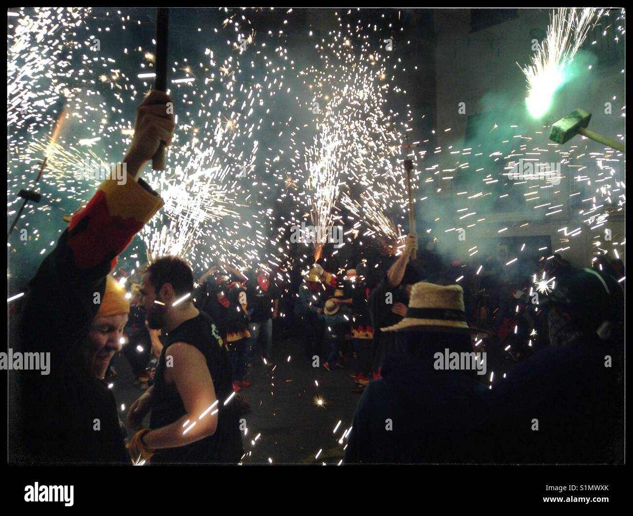Les Diables 'Figots Satànics' perform at the Fiesta Major finale, Riba-Roja d'Ebre, Catalonia, Spain. - Smartphone Captured Stock Image