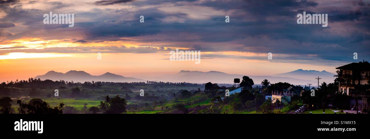 Panoramic view of Alfonso, Batangas, Philippines with mountains and beautiful sunset in the background. Stock Photo