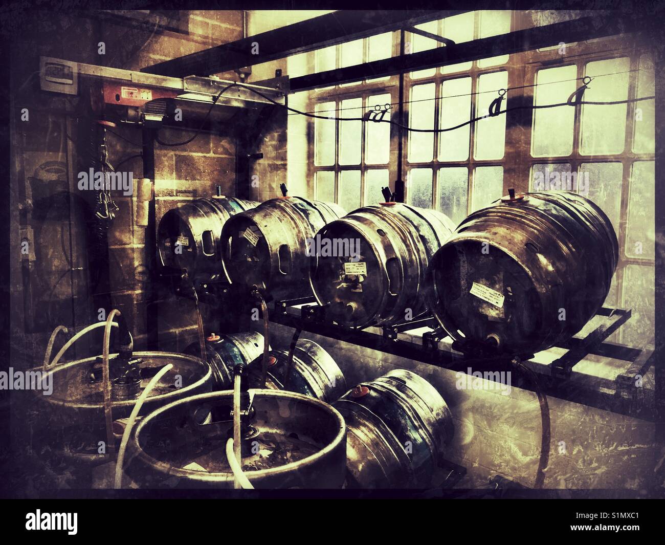 Beer Kegs in a Microbrewery Tap Room. Stock Photo