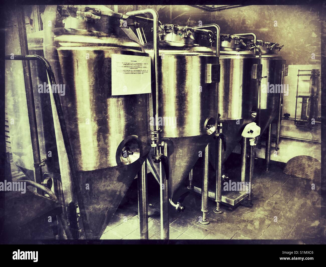 Fermentation Vessels at a Craft Brewery. Stock Photo