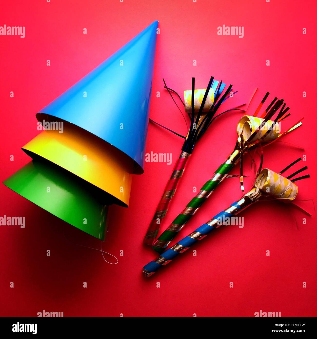 A bright colourful shot of party hats and noise makers Stock Photo Alamy