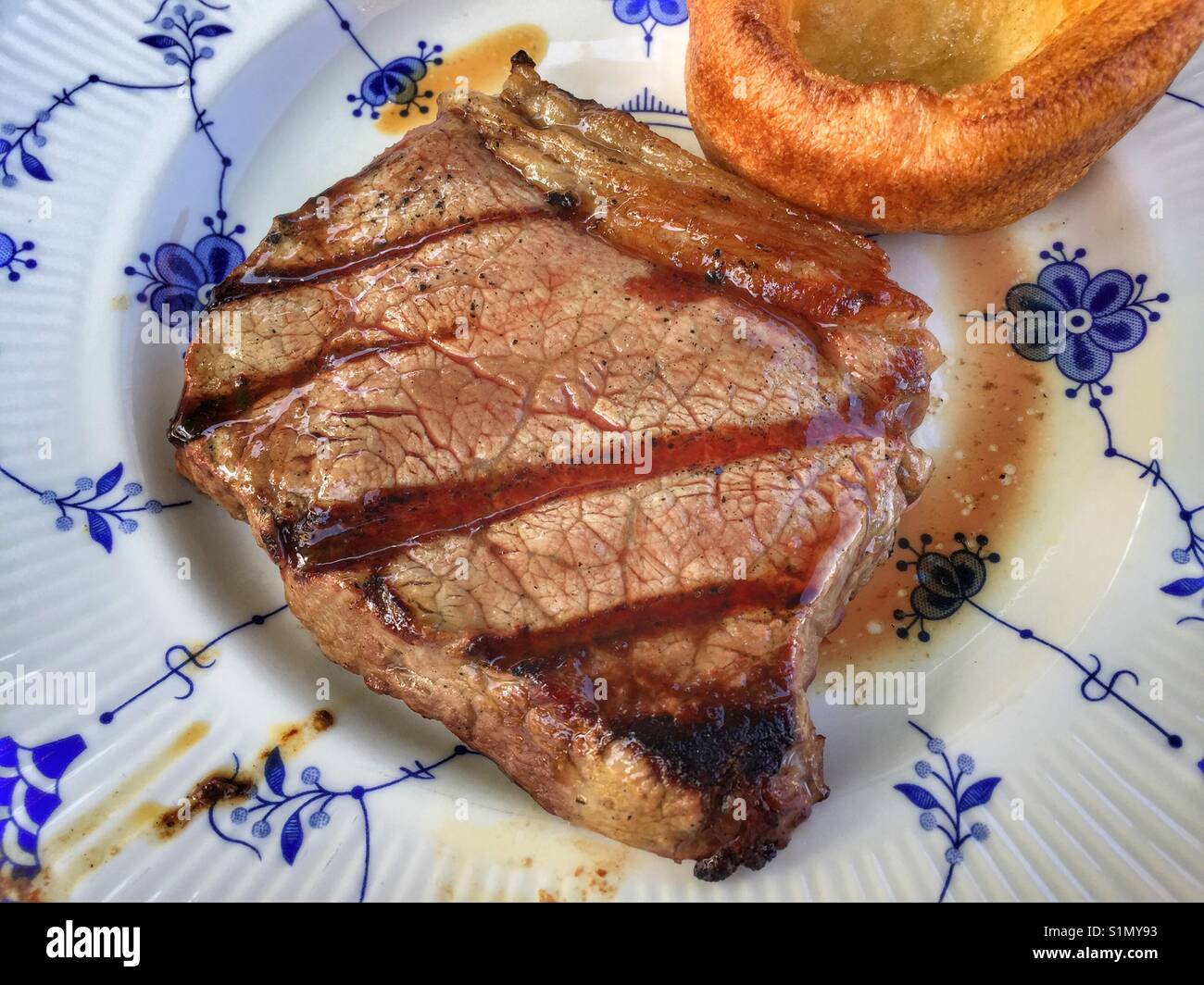 Steak and Yorkshire pudding on a plate Stock Photo Alamy