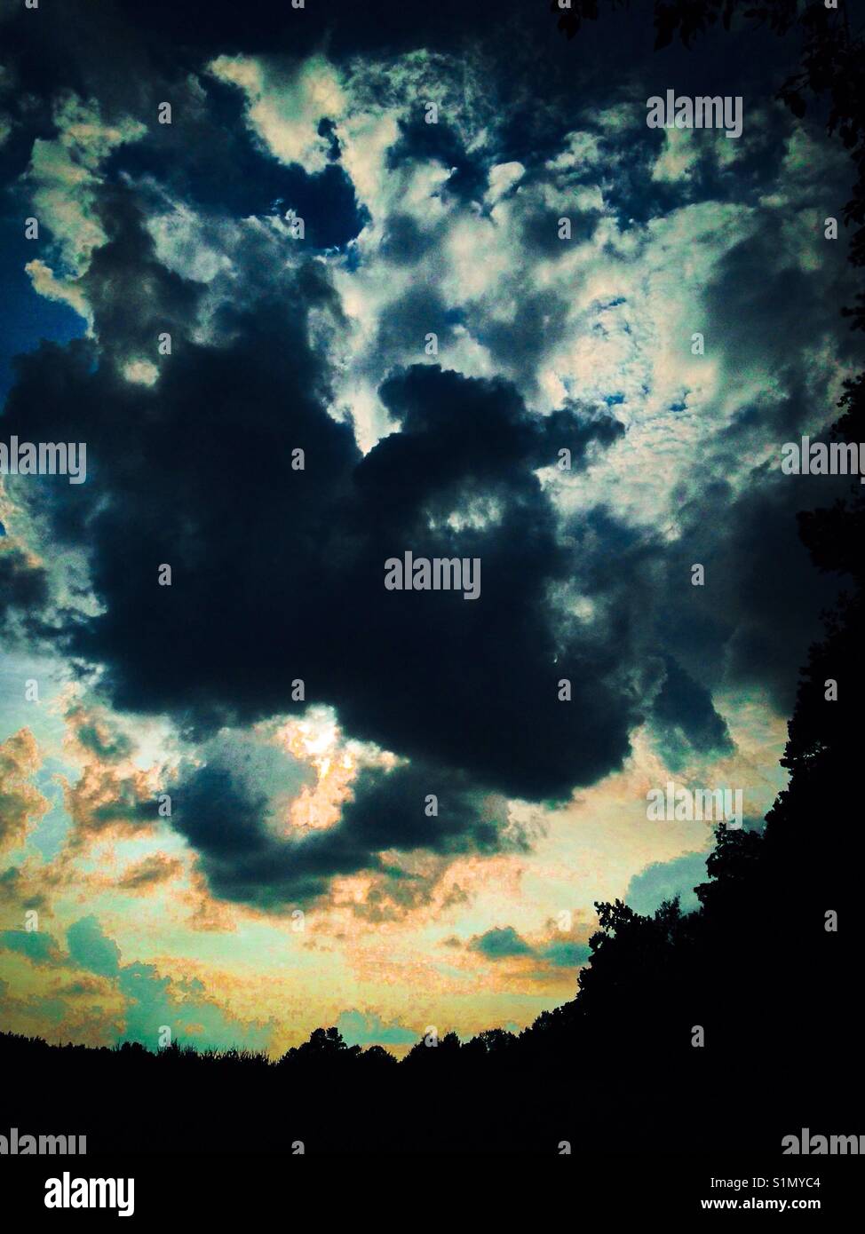 Dark clouds in afternoon light - Smartphone Captured Stock Image