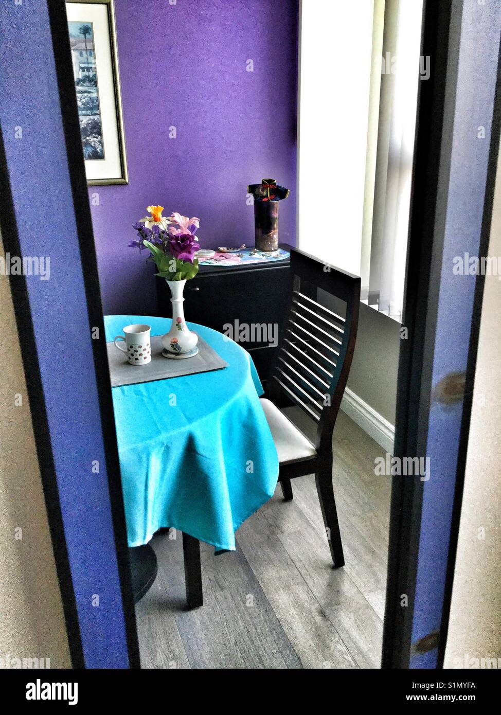 Mirror reflection of a breakfast nook. - Smartphone Captured Stock Image