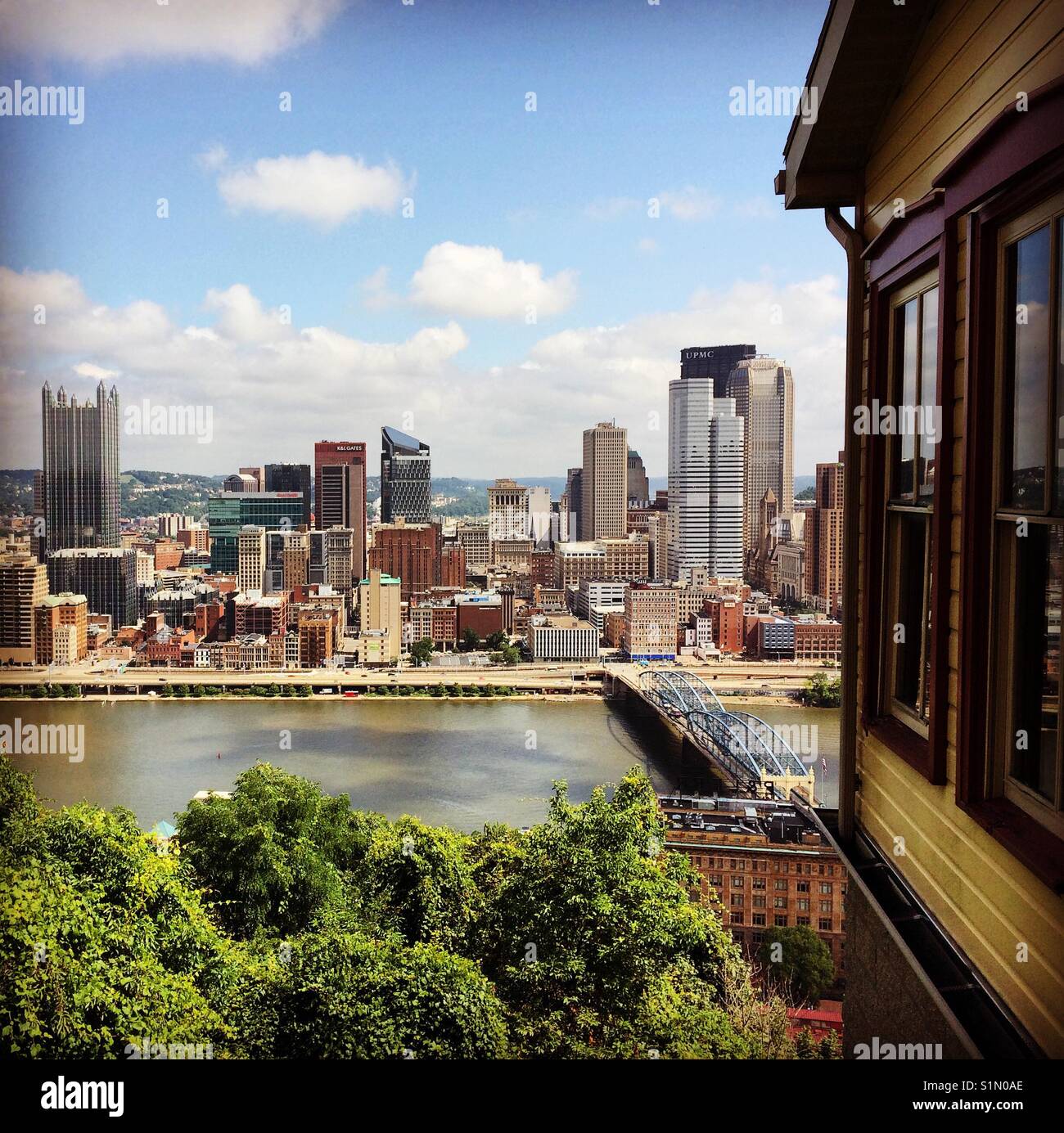 A view of from Mount Washington, Monongahela Incline entrance to the right, Pittsburgh, Pennsylvania - Smartphone Captured Stock Image