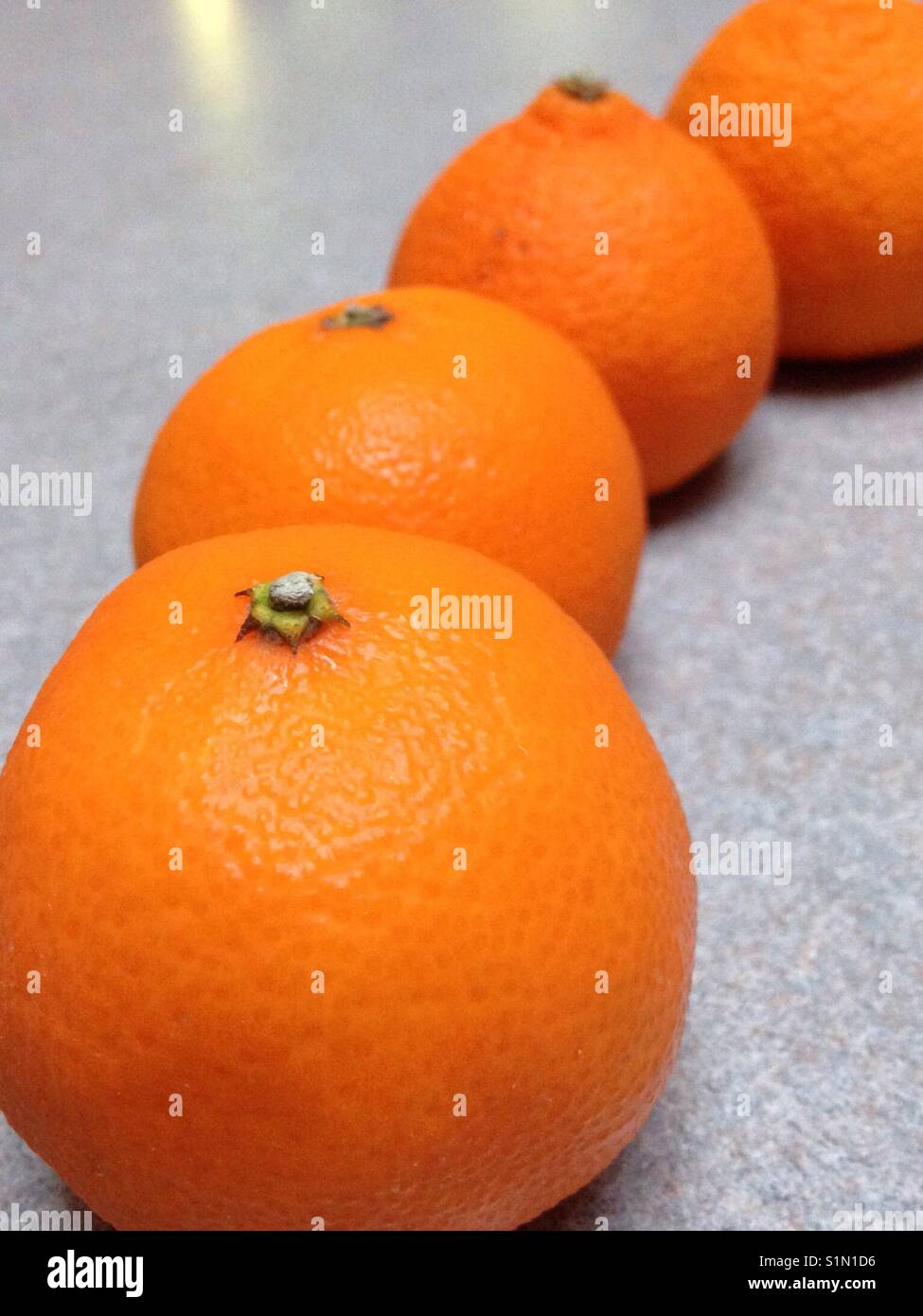Oranges on a countertop Stock Photo