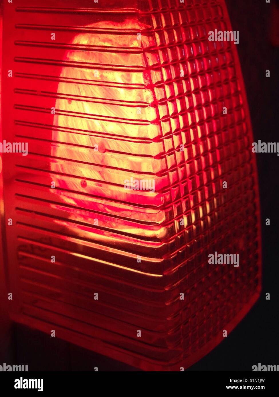 The detail on a night light with a red bulb - abstract effect Stock Photo