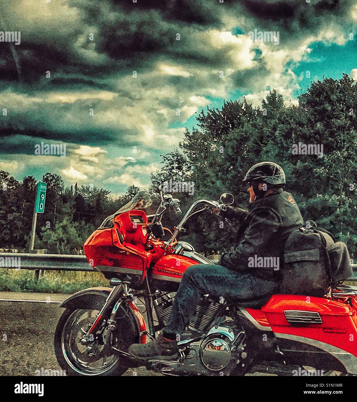 Motorcyclist on the highway. Stock Photo