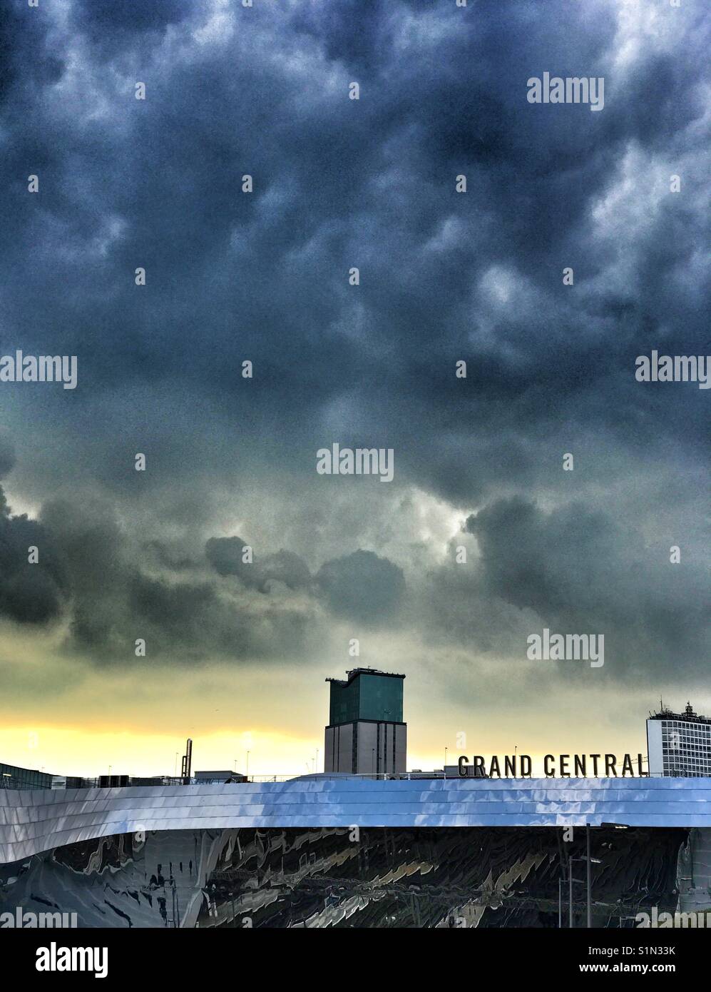 Dark clouds over Grand Central Station, Birmingham, UK Stock Photo