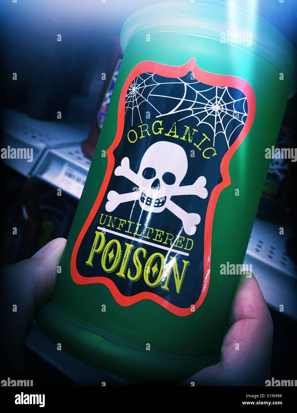 Humorous Halloween Display of organic  poison with skull and crossbones USA Stock Photo