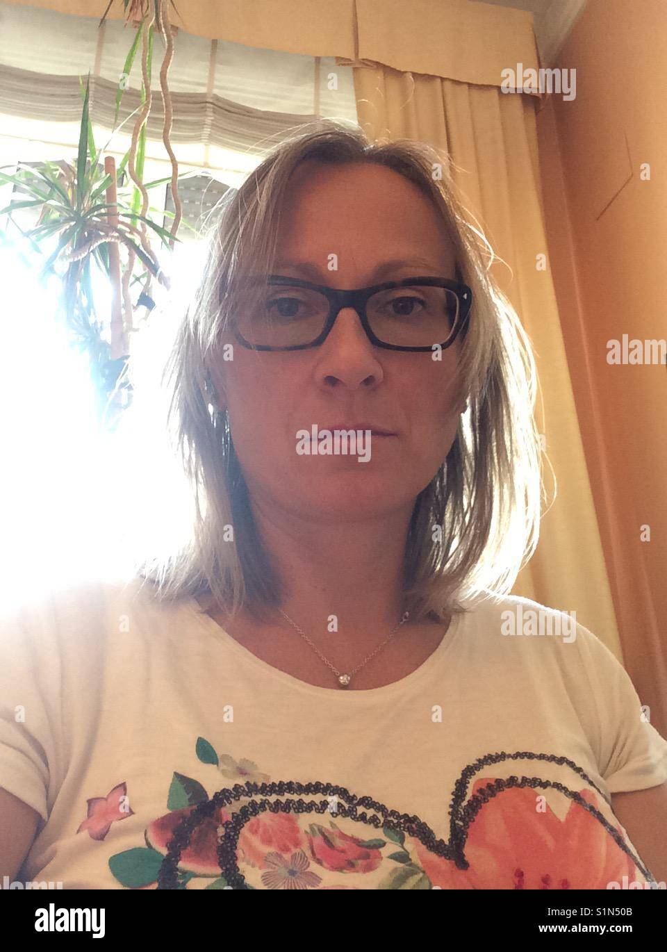 Backlight woman. - Smartphone Captured Stock Image